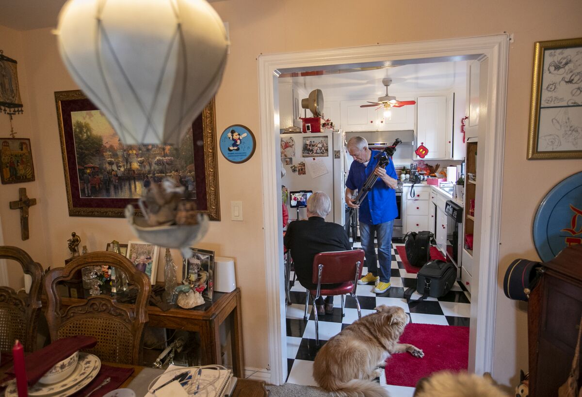 Pat Pattison breaks down his equipment following an interview with Stanford Freese at Freese's Placentia home.