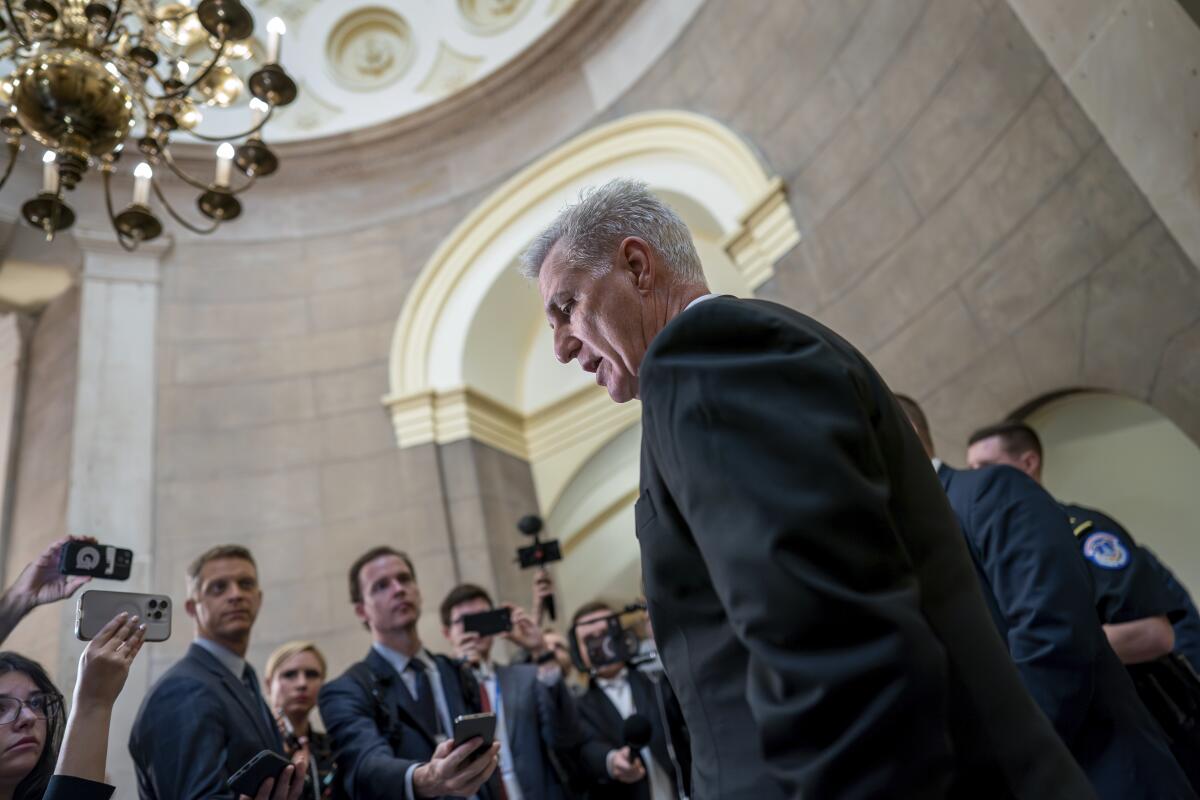 House Speaker Kevin McCarthy talks with reporters