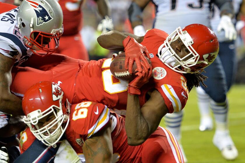 Kansas City Chiefs running back Jamaal Charles scores a second-quarter touchdown during Monday's game against the New England Patriots.