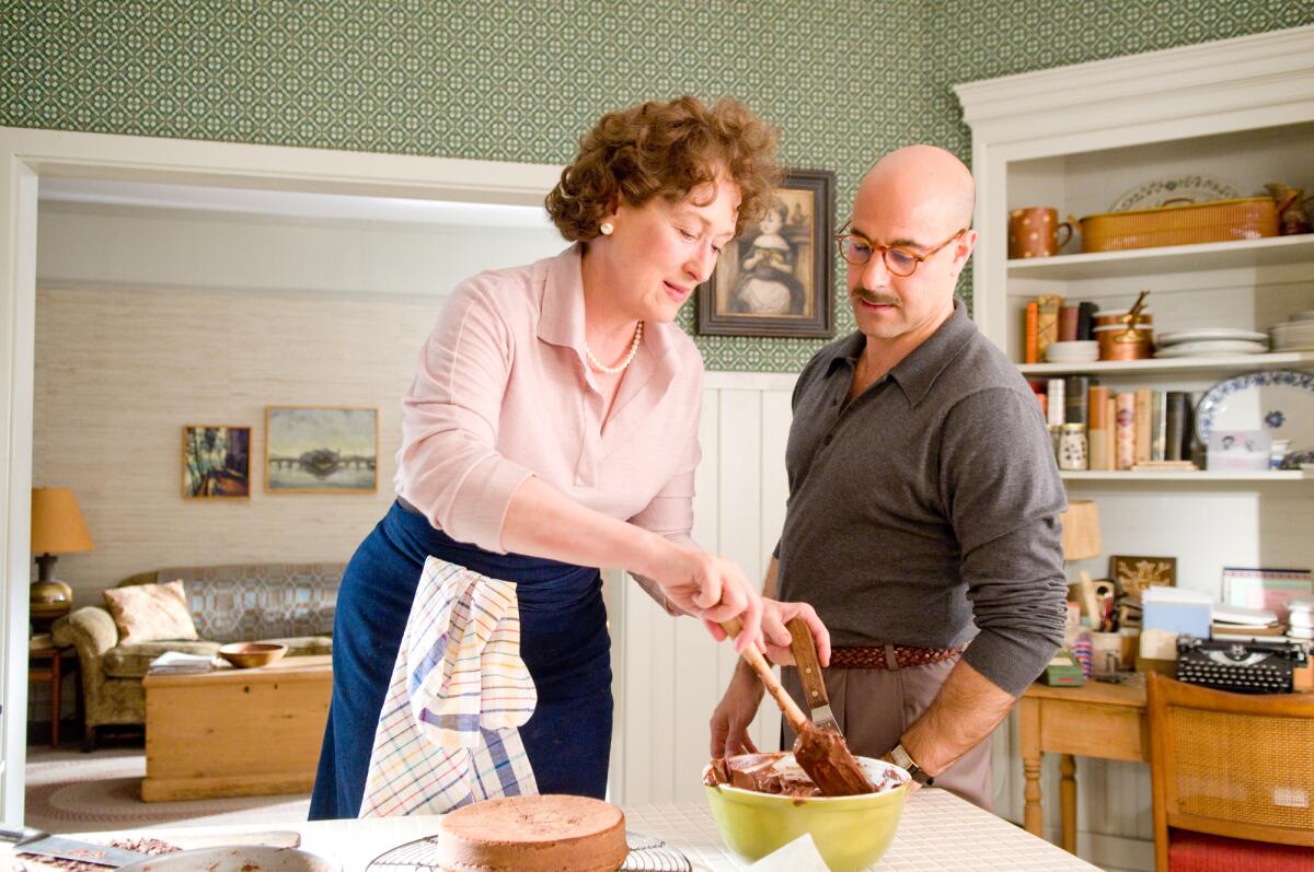 Meryl Streep as Julia Child and Stanley Tucci as Paul Child in the kitchen in “Julie & Julia” (2009)