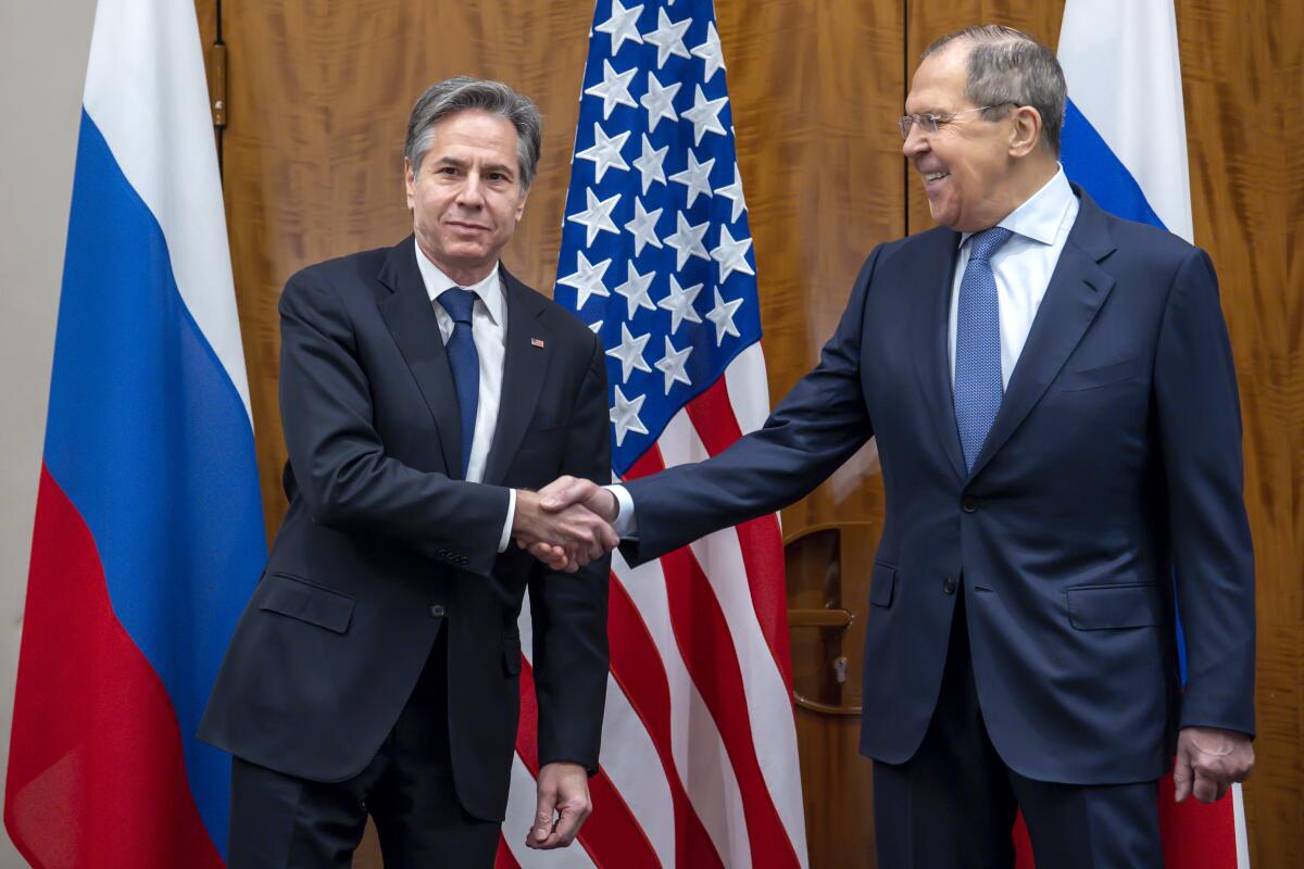 Secretary of State Antony J. Blinken shaking hands with Russian Foreign Minister Sergei Lavrov