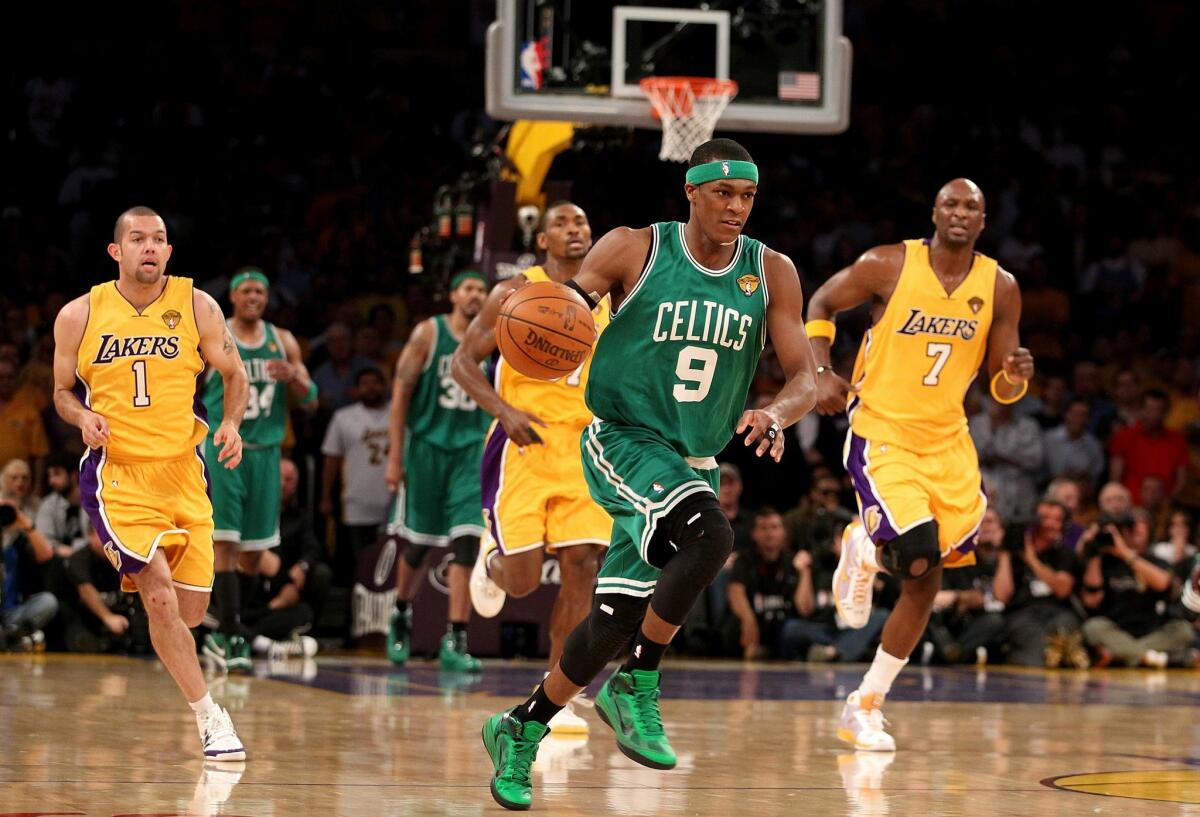 LOS ANGELES, CA - JUNE 17: Rajon Rondo #9 of the Boston Celtics drives the ball up court followed by the Los Angeles Lakers in Game Seven of the 2010 NBA Finals at Staples Center on June 17, 2010 in Los Angeles, California. NOTE TO USER: User expressly acknowledges and agrees that, by downloading and/or using this Photograph, user is consenting to the terms and conditions of the Getty Images License Agreement. (Photo by Christian Petersen/Getty Images) ORG XMIT: 99856385