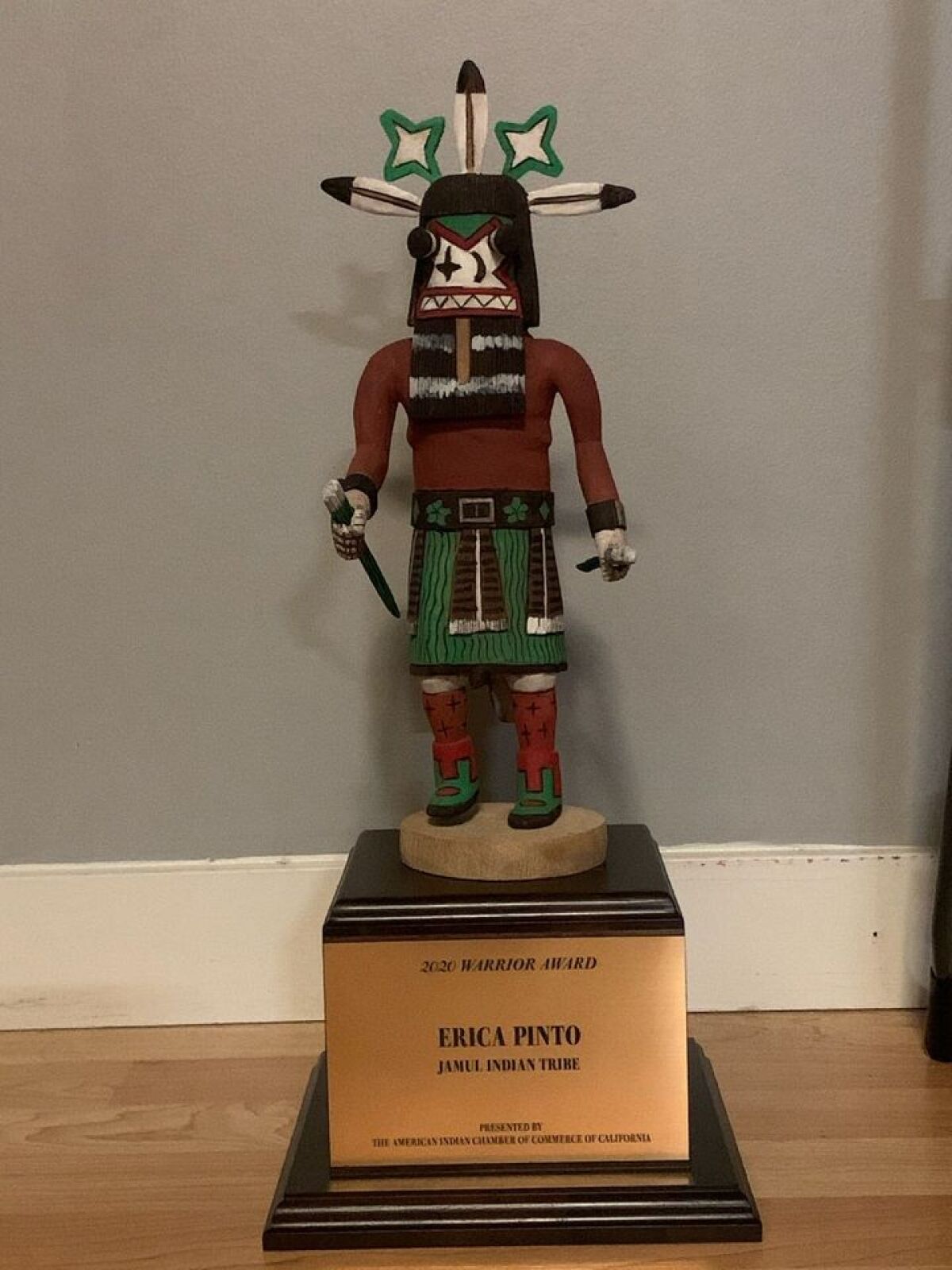 The kachina doll given to Erica Pinto from the American Indian Chamber of Commerce of California.