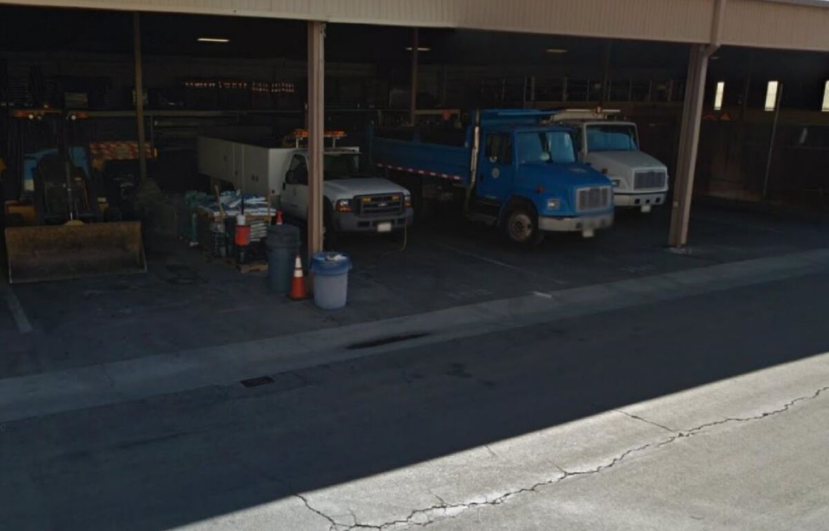 This partially enclosed equipment garage at Newport Beach's public works yard could hold trailers for a homeless shelter, according to an outline for the proposed facility.