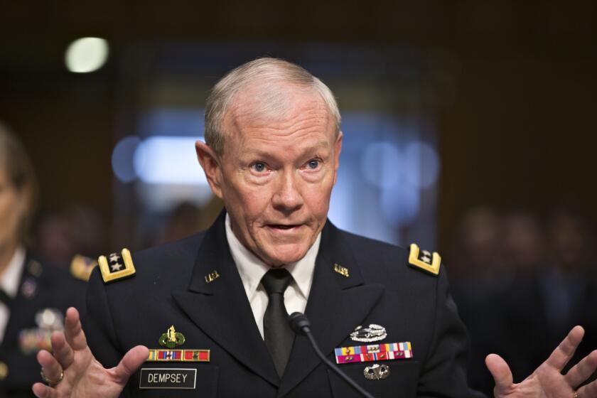 Army Gen. Martin Dempsey, chairman of the Joint Chiefs of Staff, appears before the Senate Armed Services Committee in Washington.