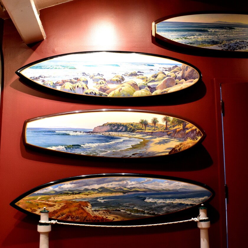 Painted surfboards on the wall at the Santa Barbara Maritime Museum.