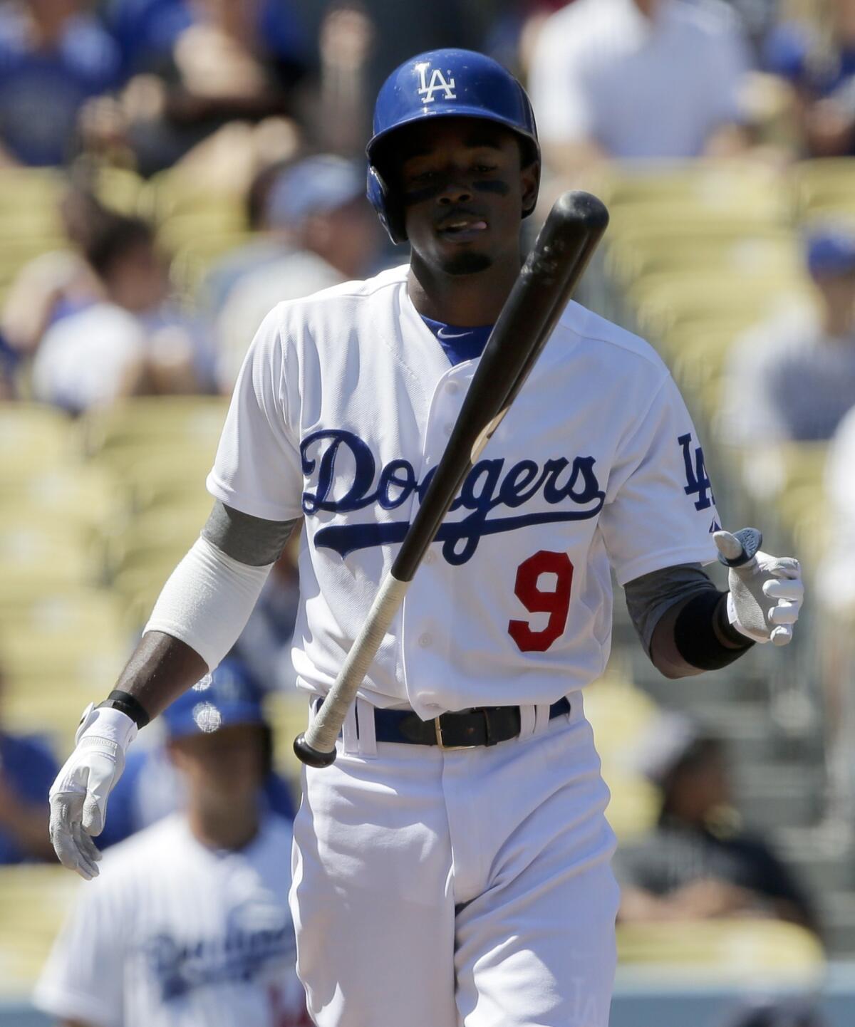 Dodgers shortstop Dee Gordon reacts after striking out during the team's 4-3 loss to the San Francisco Giants on Sunday afternoon.