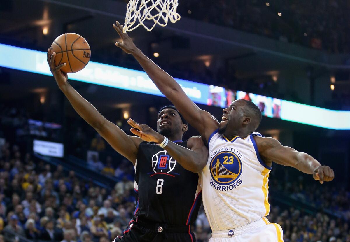 Clippers forward Jeff Green (8), attempting a layup against Warriors forward Draymond Green, is likely to return to the team.