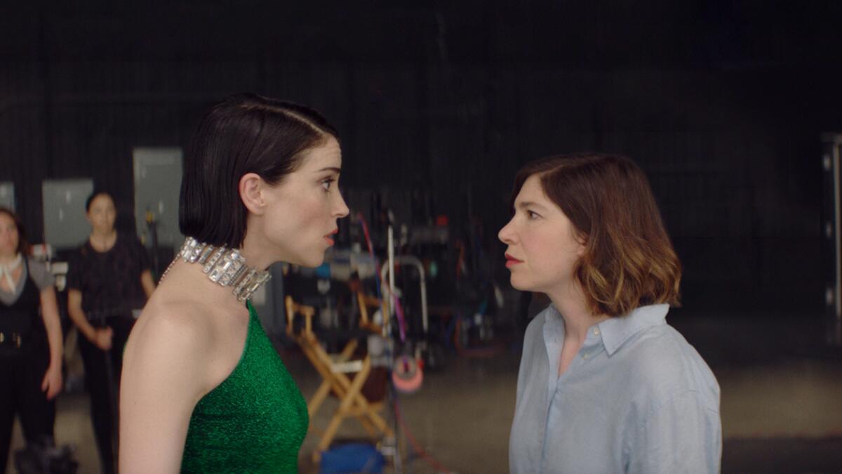 St. Vincent, left, as herself and Carrie Brownstein as herself in Bill Benz’s “The Nowhere Inn.” 