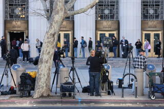 A media camp is set-up outside the Spring Street Courthouse