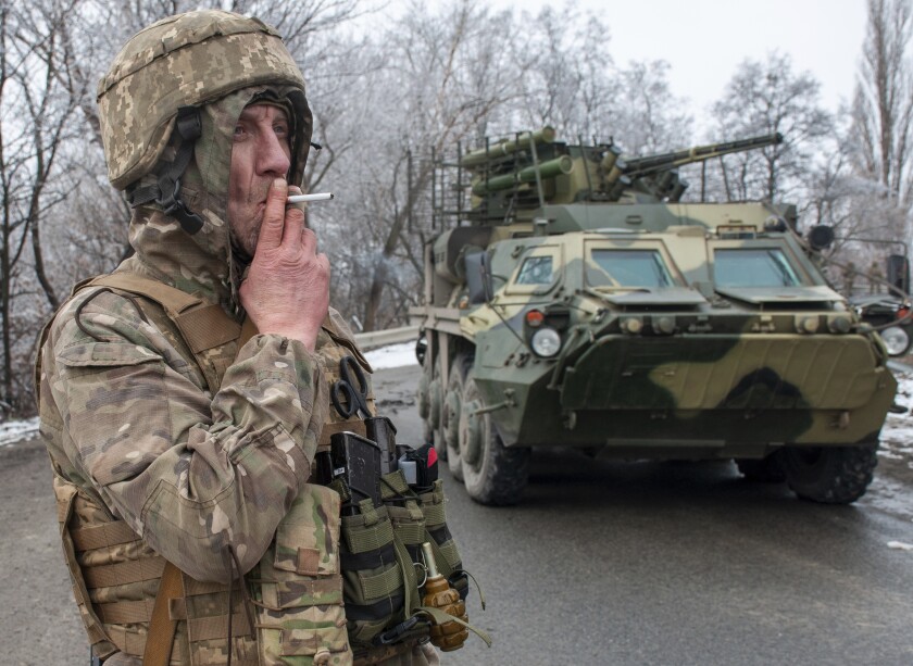 A Ukrainian soldier at his position outside Kharkiv, Ukraine, on Saturday.