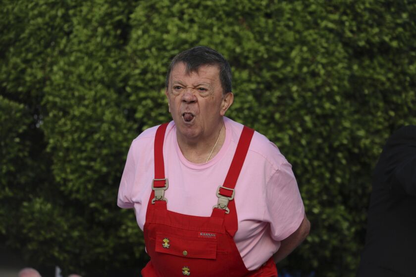 Xavier "Chabelo" Lopez sticks out his tongue during a CRIT telethon event in Tlalnepantla, Mexico, Saturday, Dec, 12, 2015. Lopez, a Mexican children’s comic better known by his stage name “Chabelo,” died at the age of 88, President Andres Manuel Lopez Obrador wrote Saturday, March 25, 2023. (Saul Lopez/Cuartoscuro via AP)