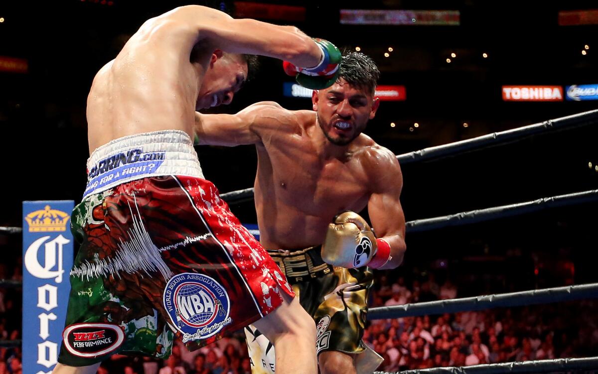 Abner Mares, right, fights Leo Santa Cruz on Aug. 29, 2015.