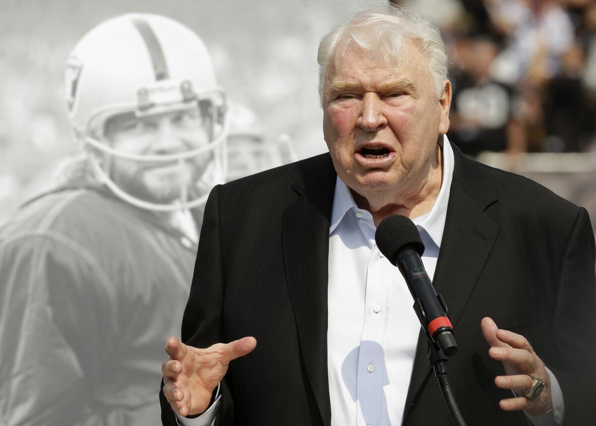 John Madden speaks during a halftime ceremony of the Raiders' Sept. 13 game against Cincinnati in Oakland.