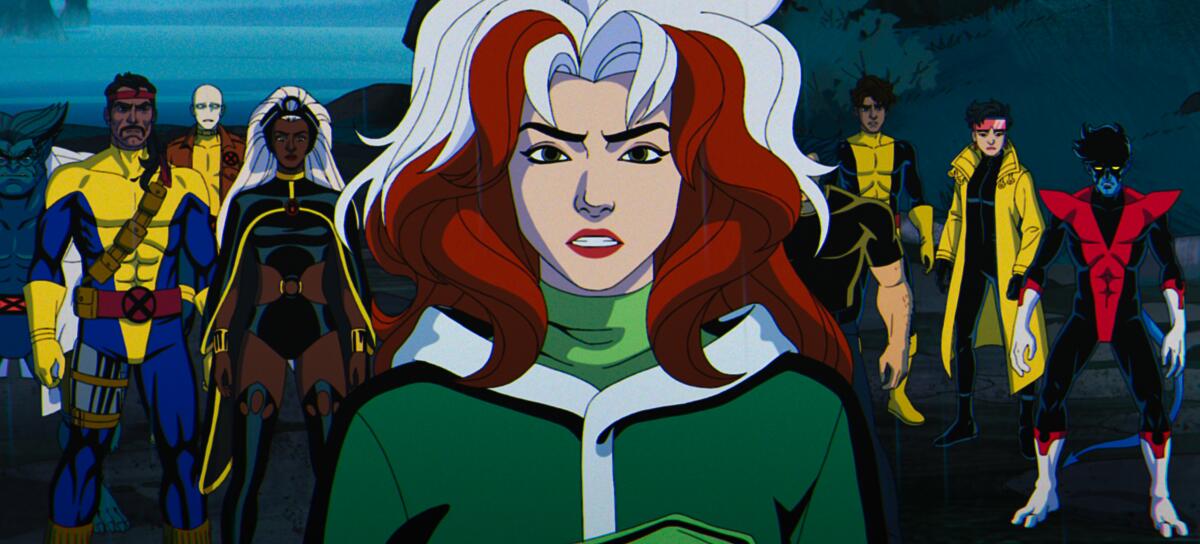 Rogue flanked by the X-Men in a scene from an animated TV series.