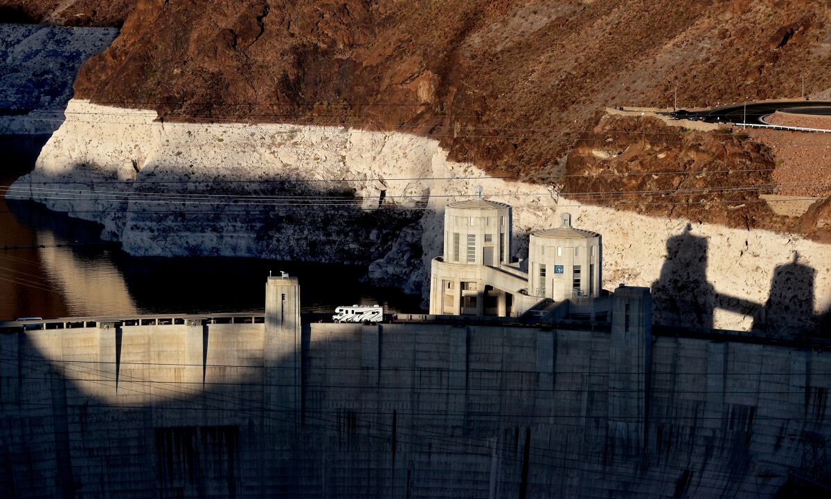A motor home travels across the Hoover Dam.