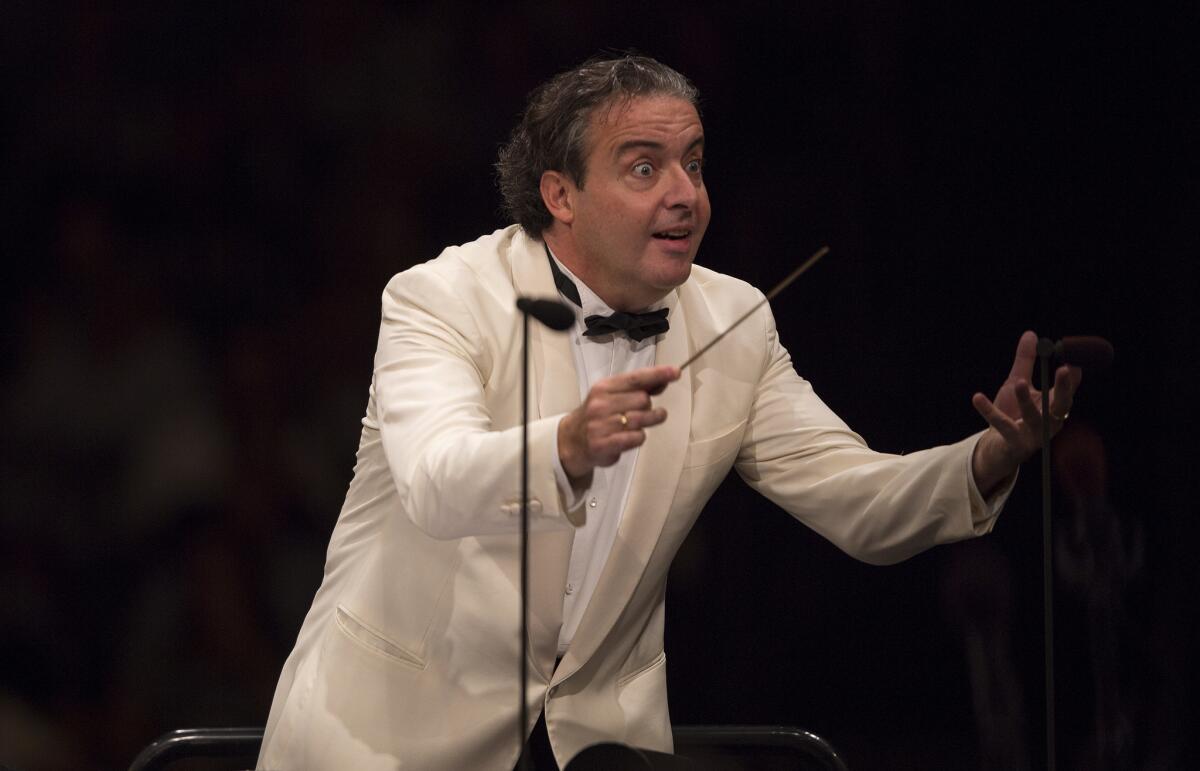 Juanjo Mena conducting the Los Angeles Philharmonic in Beethoven's Ninth Symphony at the Hollywood Bowl.
