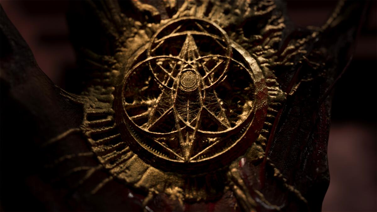 A mystical-looking metal object is one of multiple creepy images from the opening sequence of "Cabinet of Curiosities."
