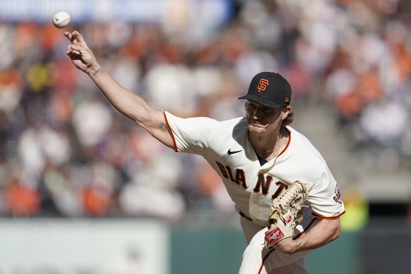FILE - San Francisco Giants' Shelby Miller pitches against the Arizona Diamondbacks during the seventh inning of a baseball game in San Francisco, Oct. 2, 2022. The Los Angeles Dodgers on Friday, Dec. 2, agreed to a $1.5 million, one-year deal with Miller for 2023. (AP Photo/Jeff Chiu, File)
