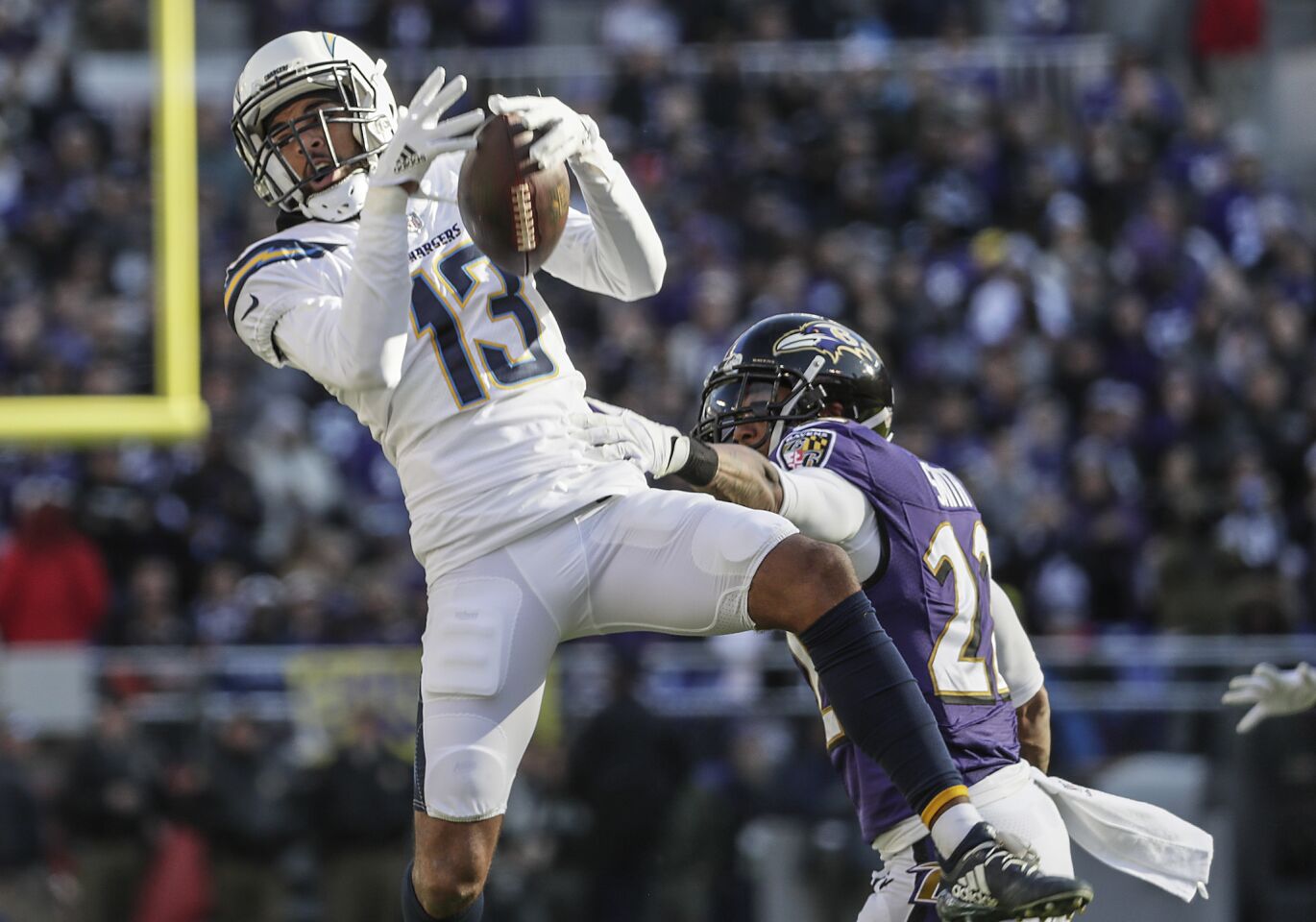 Chargers receiver Keenan Allen pulls down a 17-yard pass over Ravens cornerback Jimmy Smith during the second quarter.