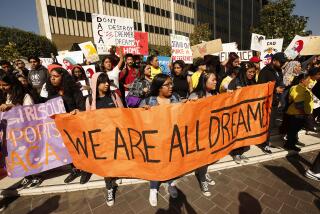 LOS ANGELES, CA - NOVEMBER 12, 2019 High school students and members of the public rally at the Roybal Federal Building in downtown Los Angeles before marching to MacArthur Park Tuesday morning as the Supreme Court hears oral arguments in Washington on the possible cancellation of the program. (Al Seib / Los Angeles Times)