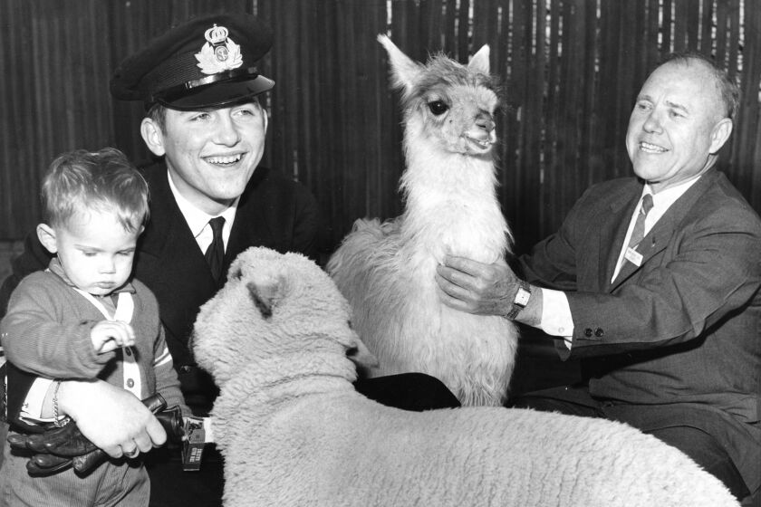 1959  photo shows Crown Prince Constantine of Greece, with Steven Smith, 2, and Dr. Charles Schroeder, at Children's Zoo