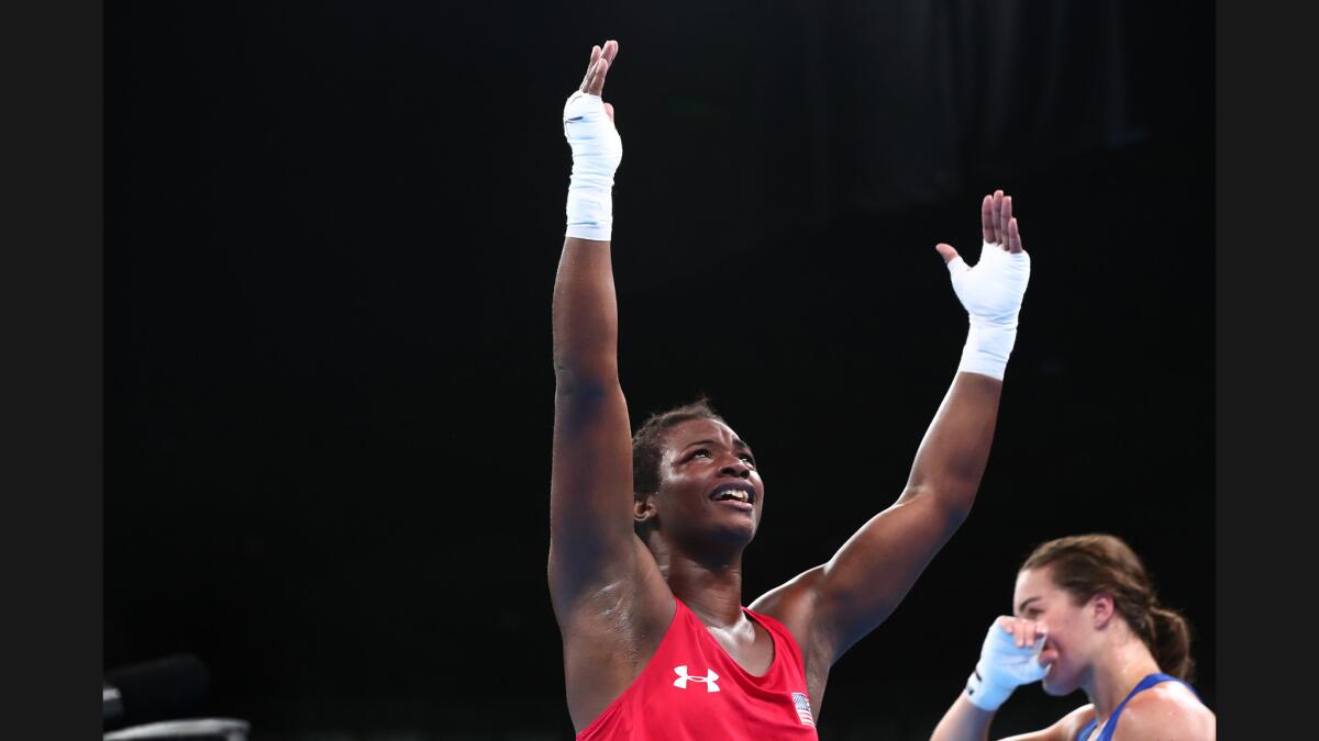 Claressa Shields celebrates after beating Nouchka Fontijn, of the Netherlands, in the women's middleweight final in 2016.