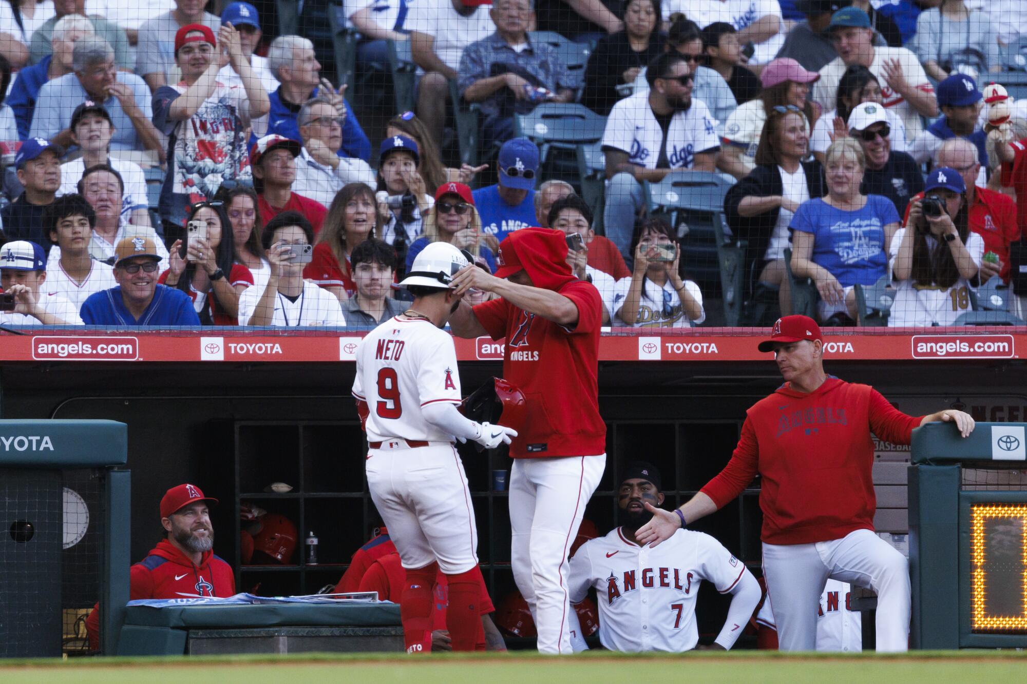 Yoshinobu Yamamoto rocked by Zach Neto and Angels as Dodgers' NL West lead falls to 1 1 Angels shortstop Zach Neto celebrates with teammates after hitting a home run in the sixth inning Monday against the Dodgers.