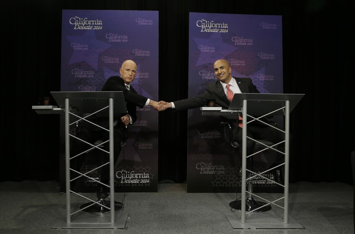 California Gov. Jerry Brown and challenger Neel Kashkari debate in Sacramento.