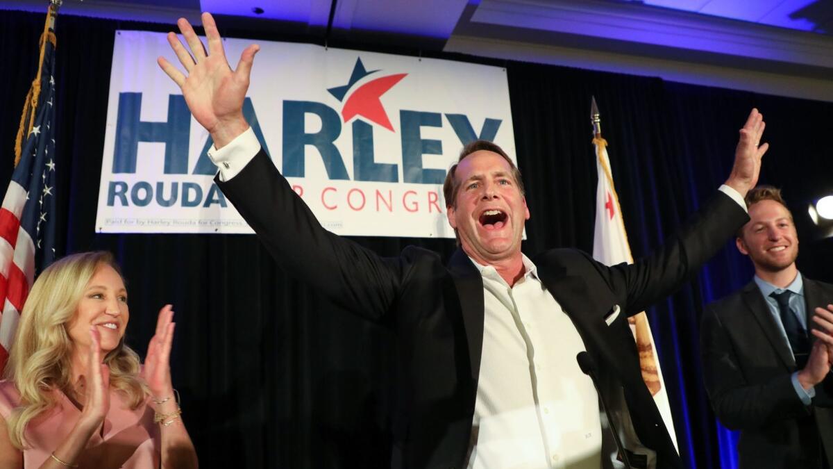 Preliminary election returns show Democrat Harley Rouda set to unseat Republican Rep. Dana Rohrabacher.