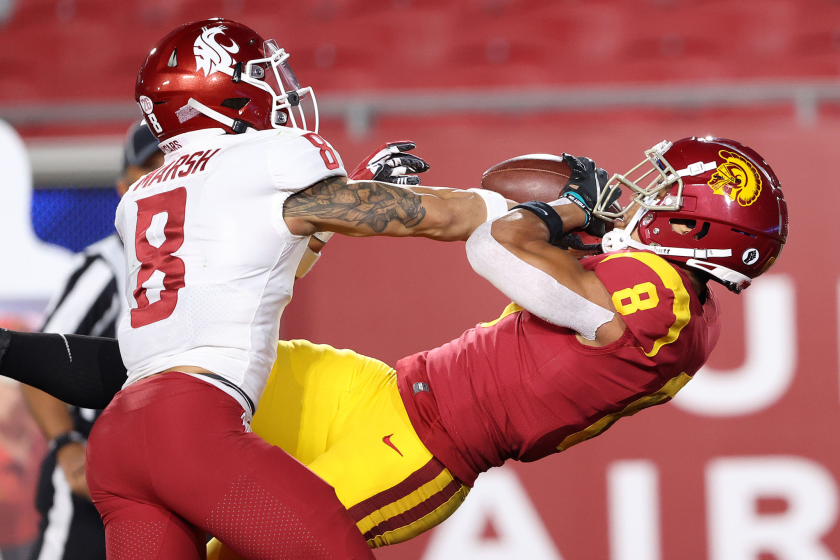 LOS ANGELES, CALIFORNIA - DECEMBER 06: Amon-Ra St. Brown #8 of the USC Trojans makes a reception.