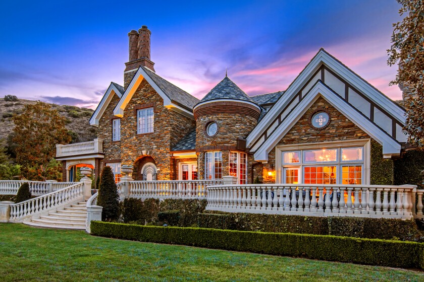 Former WWE champion Michael "The Miz" Mizanin and his wife, wrestler Maryse Mizanin, have paid $6.4 million for an English manor-style home in Westlake Village.