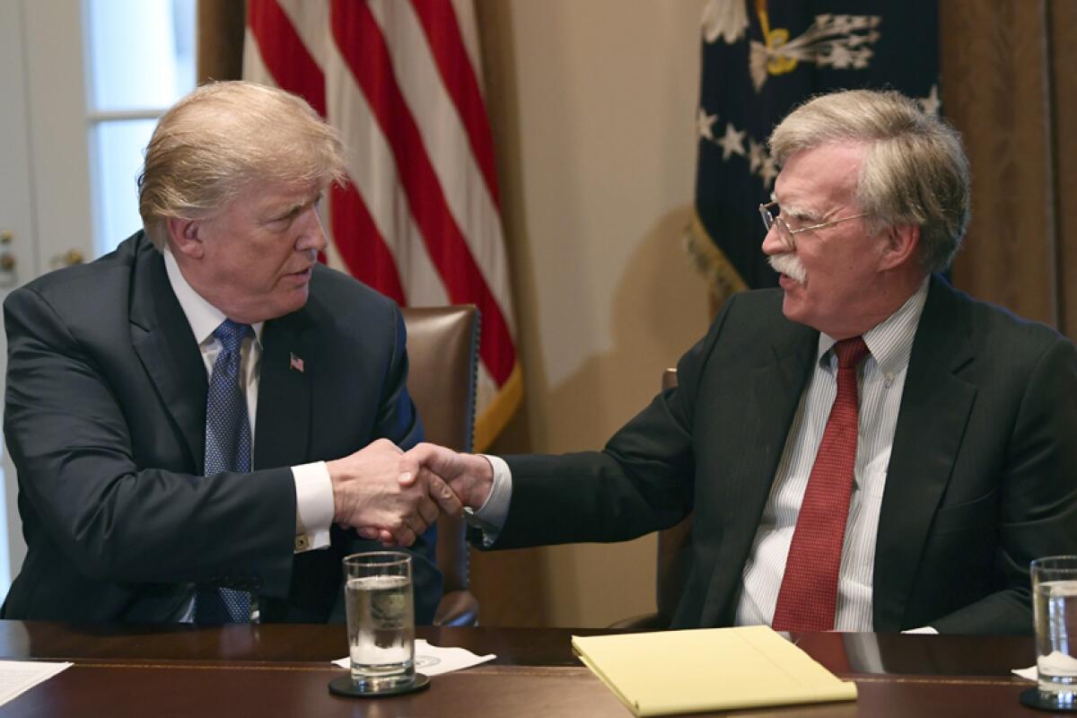 President Trump with national security advisor John Bolton in April 2018. 