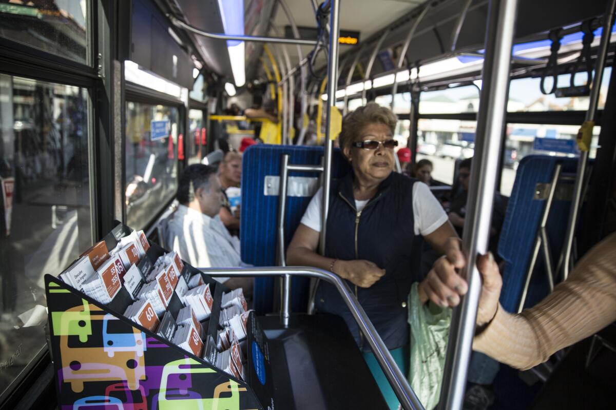 Metro bus riders in Huntington Park. Measure M would fund a massive expansion of rail, bus and freeway routes across Los Angeles County.
