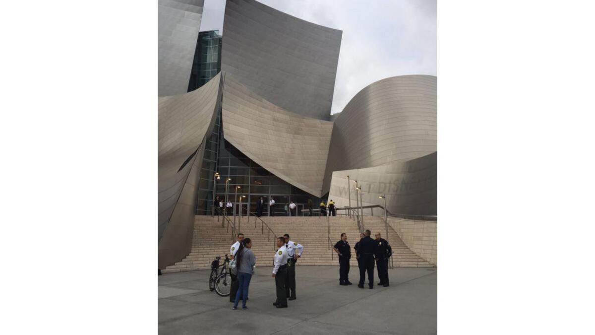 Police stand outside the Walt Disney Concert Hall, where a child was injured in an attack in December.