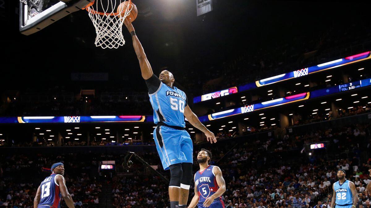 Power player/captain Corey Maggette (50) shoots as Tri-State's Mike James and Xavier Silas (5) look on during the first half of Game 2 in the BIG3 Basketball League's debut on Sunday.