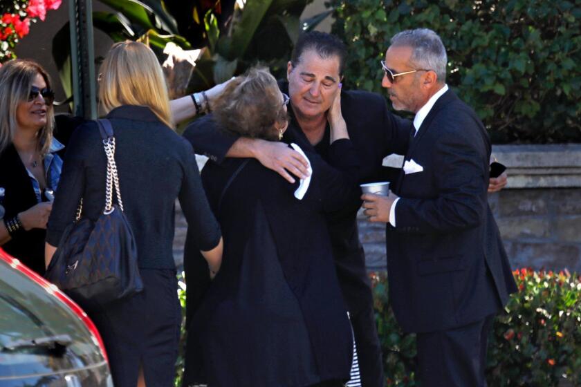 PARKLAND, FLORIDA--FEB. 16, 2018--The memorial and burial for Meadow Paddock, age 18, one of the shooting victims at Marjorie Stonemason Douglas High School. Family members greet one another as they arrive for the service and burial at the Kol Tikvah Congregational Synagogue on Feb. 16, 2018. (Carolyn Cole/Los Angeles Times) Kol Tikvah Congregational Synagogue.