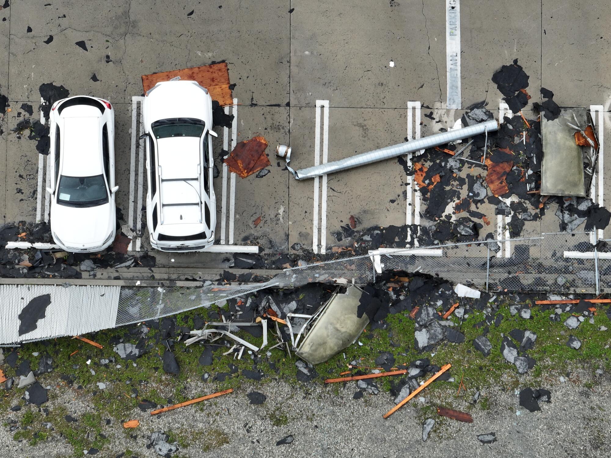 Crews clean up debris after a tornado hit Montebello.