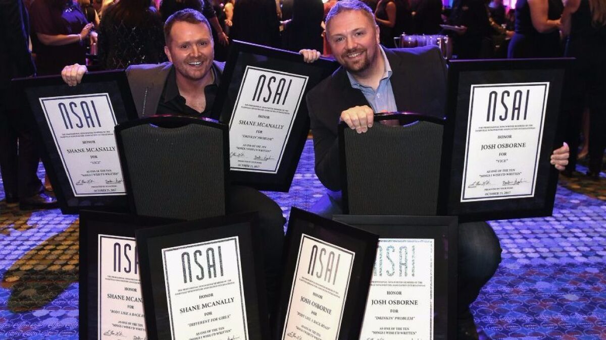 Songwriters Shane McAnally and Josh Osborne, seen here at the 2017 Nashville Songwriters Hall Of Fame Awards, are nominated for two Grammy awards.