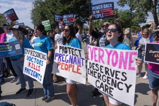 Demonstrators gather outside the Supreme Court on Friday, June 28, 2024, in Washington. (AP Photo/Mark Schiefelbein)