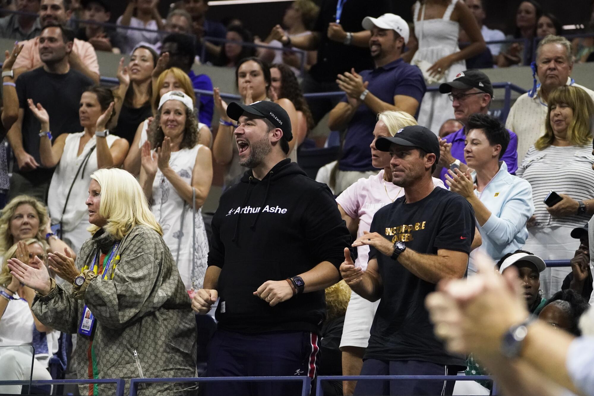Alexis Ohanian and fans cheer for Serena Williams during her match against Anett Kontaveit.