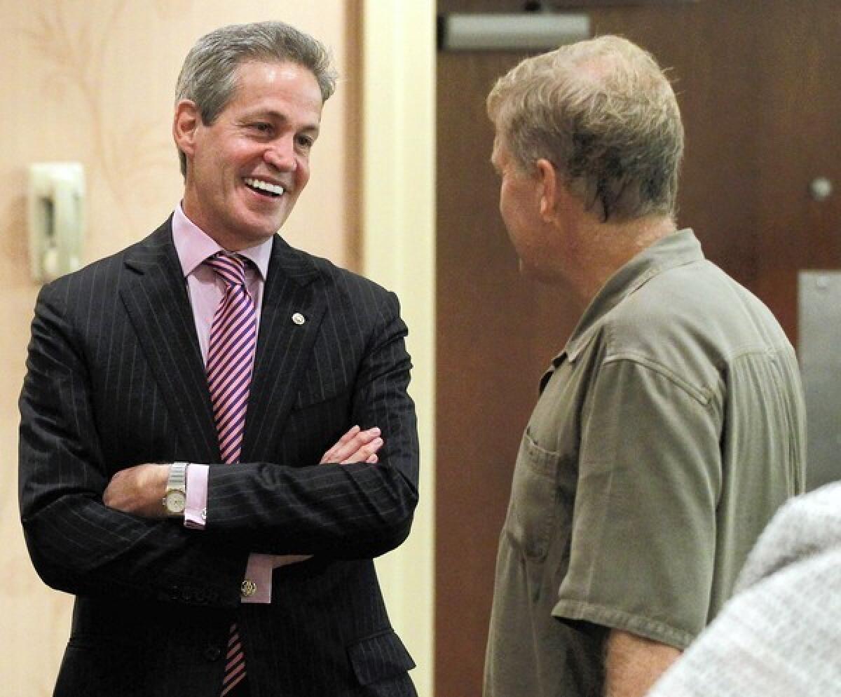 Former Sen. Norm Coleman (R-Minn.), pictured in August, gave the opening address at a meeting of Mitt Romney donors and leaders of the “super PAC” Restore Our Future. Coleman is a foreign policy advisor for Romney.