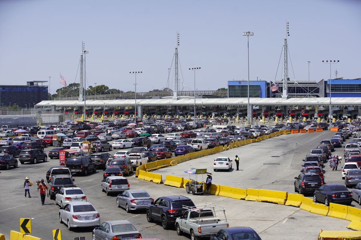  Traffic into San Ysidro from Tijuana at the San Ysidro Border Crossing on Tuesday, Aug. 25, 2020 