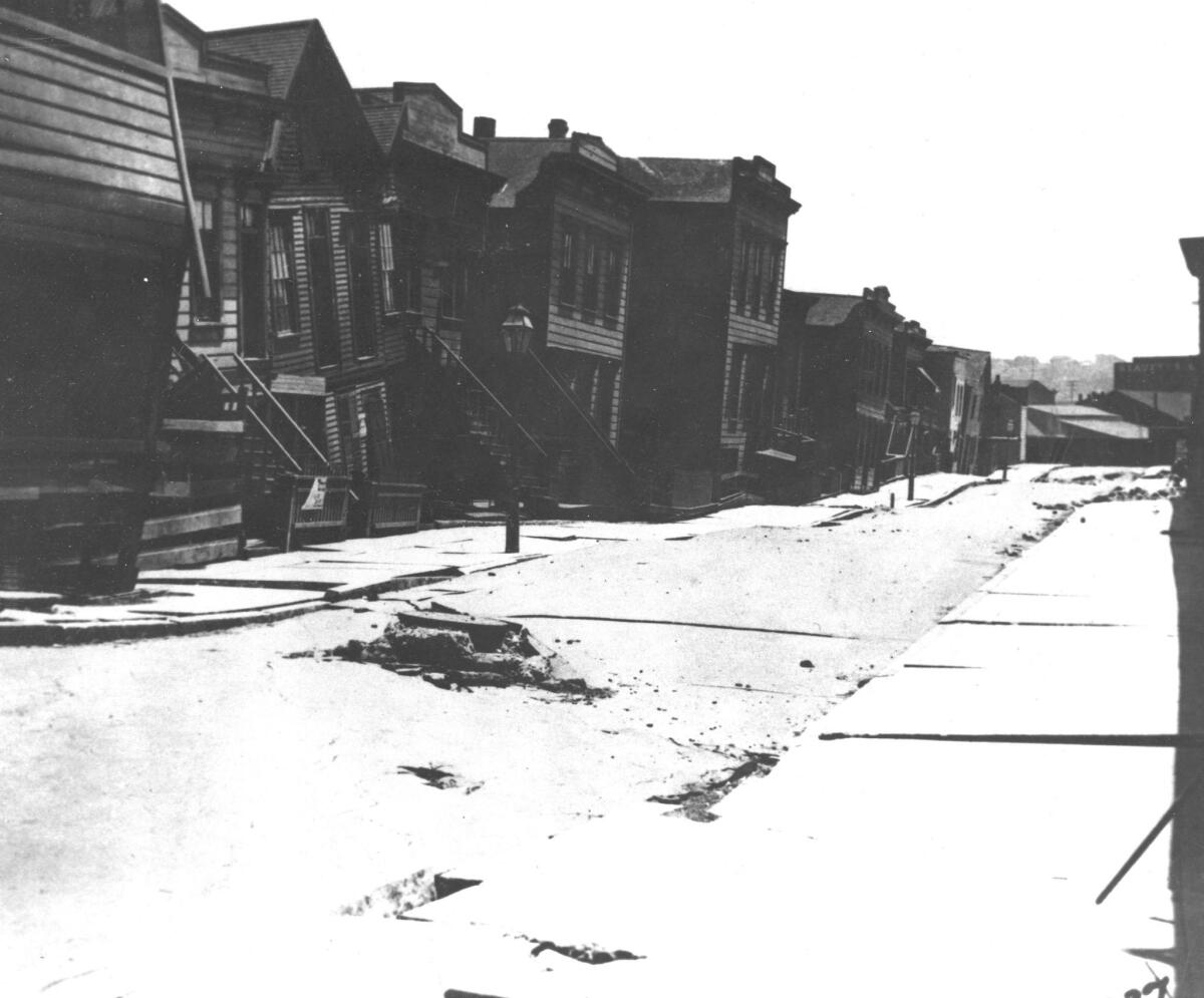 View along Dore Street from Bryant Street toward Brannan Street, San Francisco. Photograph after the 1906 earthquake showing undulations as large as 6 feet in street.