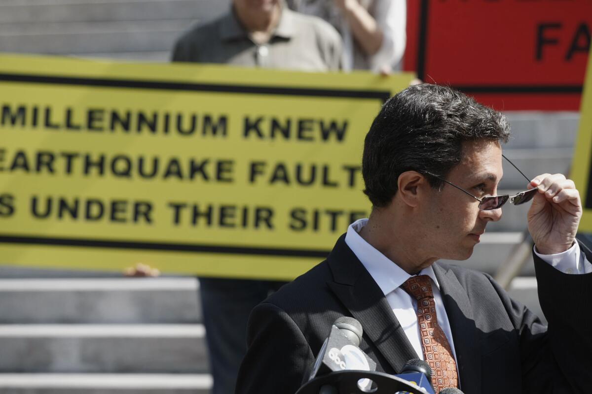 Robert Silverstein, attorney for a coalition of 40 community groups opposed to the Millennium Hollywood project, speaks at a press conference in front of Los Angeles City Hall in Los Angeles.