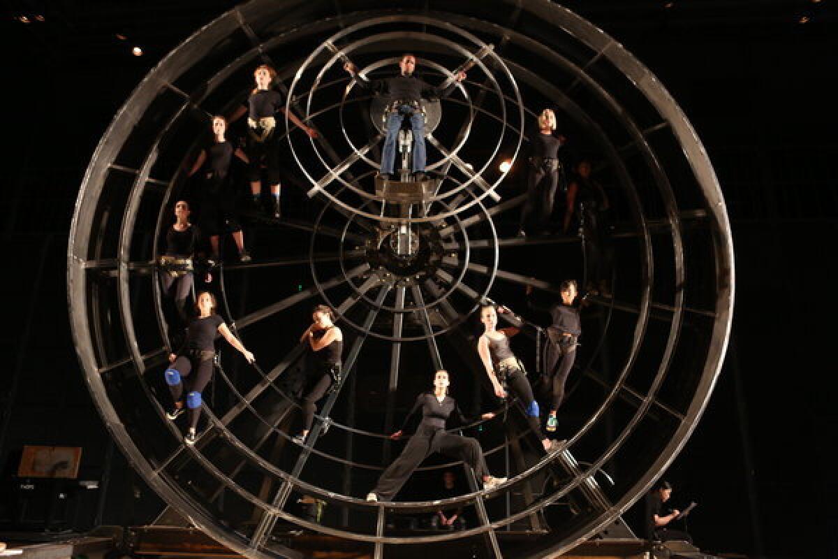 Actors rehearse in March at CalArts for the production of "Prometheus Bound" that will begin Aug. 29 at the Getty Villa. The staging's centerpiece is a five-ton, 23-foot-high steel wheel that will arrive on the Villa's plaza in mid-July.