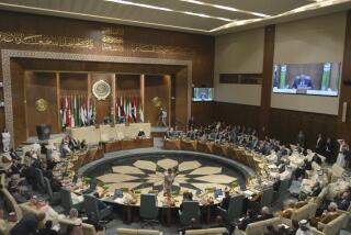 In this photo released by Egypt's Ministry of Foreign Affairs, delegates and foreign ministers of member states convene at the Arab League headquarters in Cairo, Egypt, Sunday, May 7, 2023. The ministers are voting on restoring Syria's membership to the organization after it was suspended over a decade ago. The meeting comes after a rapid rapprochement between Syria and regional governments since February. (Egyptian Ministry of Foreign Affairs via AP)