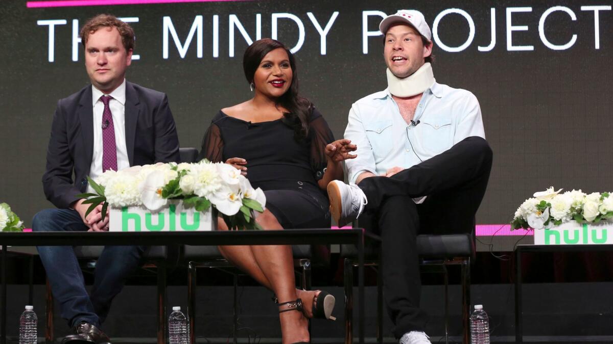"The Mindy Project" creator/executive producer/star Mindy Kaling with executive producers Matt Warburton, left, and Ike Barinholtz at the show's Television Critics Assn. press tour panel.