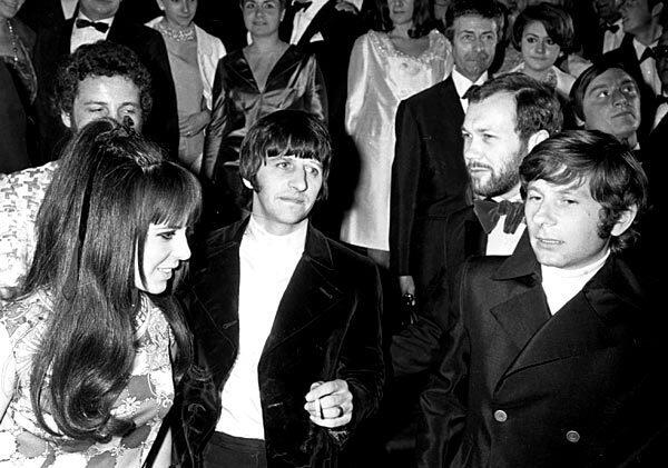 Ringo Starr, center, arrives with his wife, Maureen, and Roman Polanski at the Festival Palace in Cannes, France. They were attending the screening of the British entry "Joanna" in the Cannes Film Festival.