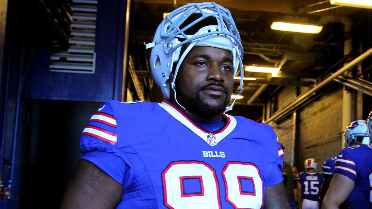 Bill defensive tackle Marcell Dareus before a game against the Dolphins last season.